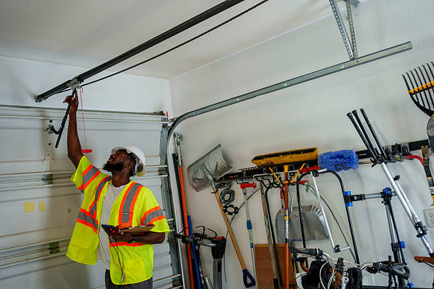 Professional Garage Door technician working in Garden City, NY